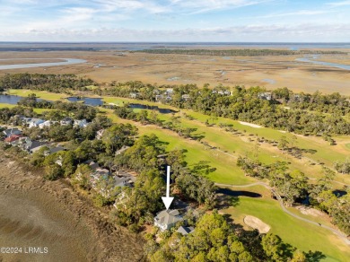 Discover your dream coastal retreat with this stunning reverse on Ocean Creek Golf Course in South Carolina - for sale on GolfHomes.com, golf home, golf lot