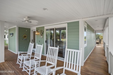 Discover your dream coastal retreat with this stunning reverse on Ocean Creek Golf Course in South Carolina - for sale on GolfHomes.com, golf home, golf lot