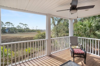 Discover your dream coastal retreat with this stunning reverse on Ocean Creek Golf Course in South Carolina - for sale on GolfHomes.com, golf home, golf lot