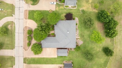 Discover your dream home nestled in coveted Pecan Plantation on Pecan Plantation Country Club in Texas - for sale on GolfHomes.com, golf home, golf lot