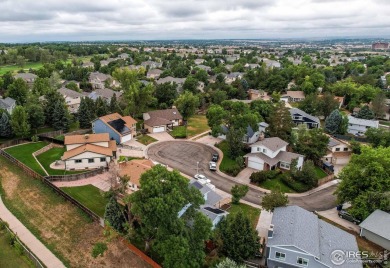 Welcome home to this comfortable home backing to the Legacy on Legacy Ridge Golf Course in Colorado - for sale on GolfHomes.com, golf home, golf lot