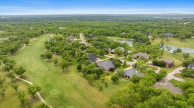 Discover your dream home nestled in coveted Pecan Plantation on Pecan Plantation Country Club in Texas - for sale on GolfHomes.com, golf home, golf lot