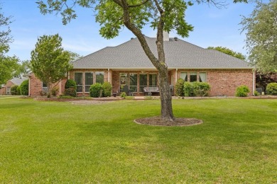 Discover your dream home nestled in coveted Pecan Plantation on Pecan Plantation Country Club in Texas - for sale on GolfHomes.com, golf home, golf lot