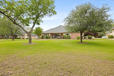 Discover your dream home nestled in coveted Pecan Plantation on Pecan Plantation Country Club in Texas - for sale on GolfHomes.com, golf home, golf lot