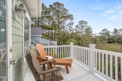 Discover your dream coastal retreat with this stunning reverse on Ocean Creek Golf Course in South Carolina - for sale on GolfHomes.com, golf home, golf lot