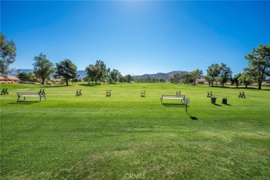 Welcome to this spectacular 2-bedroom, 2-bathroom home on Sun Lakes Country Club in California - for sale on GolfHomes.com, golf home, golf lot