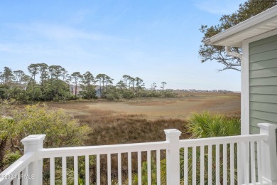 Discover your dream coastal retreat with this stunning reverse on Ocean Creek Golf Course in South Carolina - for sale on GolfHomes.com, golf home, golf lot