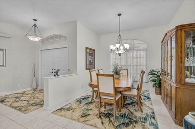 Gracefully set along the prestigious Calusa Lakes Golf Course on Calusa Lakes Golf Club in Florida - for sale on GolfHomes.com, golf home, golf lot