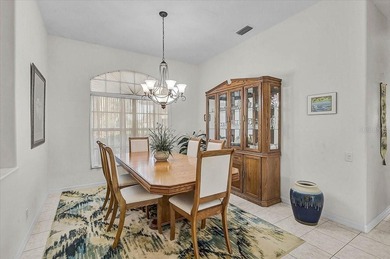 Gracefully set along the prestigious Calusa Lakes Golf Course on Calusa Lakes Golf Club in Florida - for sale on GolfHomes.com, golf home, golf lot