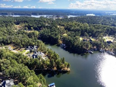 Seize this rare opportunity to own a stunning lakefront lot in on Reynolds Lake Oconee - The Oconee in Georgia - for sale on GolfHomes.com, golf home, golf lot