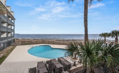 Discover coastal living with this stunning oceanfront cottage on Ocean Point Golf Links in South Carolina - for sale on GolfHomes.com, golf home, golf lot