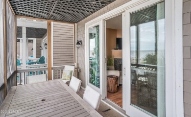 Discover coastal living with this stunning oceanfront cottage on Ocean Point Golf Links in South Carolina - for sale on GolfHomes.com, golf home, golf lot
