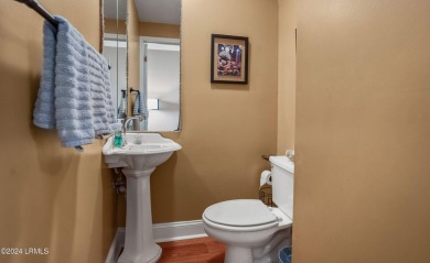 Discover coastal living with this stunning oceanfront cottage on Ocean Point Golf Links in South Carolina - for sale on GolfHomes.com, golf home, golf lot