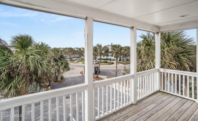 Discover coastal living with this stunning oceanfront cottage on Ocean Point Golf Links in South Carolina - for sale on GolfHomes.com, golf home, golf lot