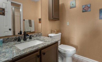 Discover coastal living with this stunning oceanfront cottage on Ocean Point Golf Links in South Carolina - for sale on GolfHomes.com, golf home, golf lot