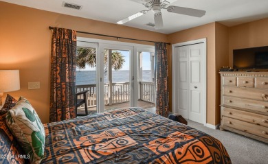 Discover coastal living with this stunning oceanfront cottage on Ocean Point Golf Links in South Carolina - for sale on GolfHomes.com, golf home, golf lot