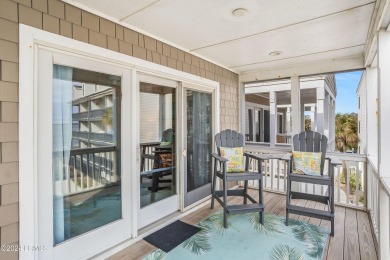 Discover coastal living with this stunning oceanfront cottage on Ocean Point Golf Links in South Carolina - for sale on GolfHomes.com, golf home, golf lot