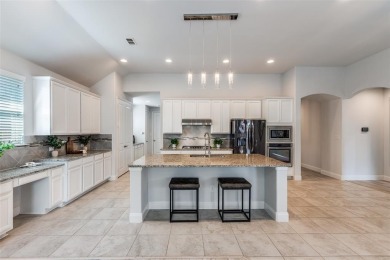 Stunning home in award-winning Tribute community on Lake on The Tribute At the Colony in Texas - for sale on GolfHomes.com, golf home, golf lot
