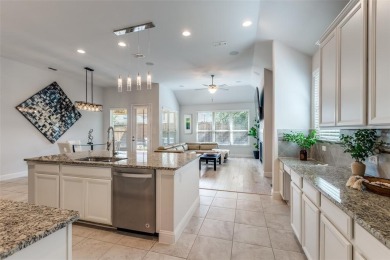 Stunning home in award-winning Tribute community on Lake on The Tribute At the Colony in Texas - for sale on GolfHomes.com, golf home, golf lot