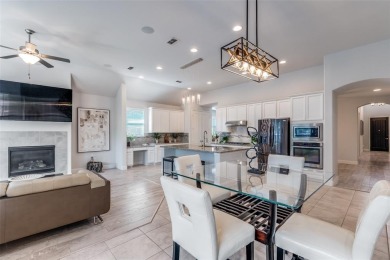 Stunning home in award-winning Tribute community on Lake on The Tribute At the Colony in Texas - for sale on GolfHomes.com, golf home, golf lot