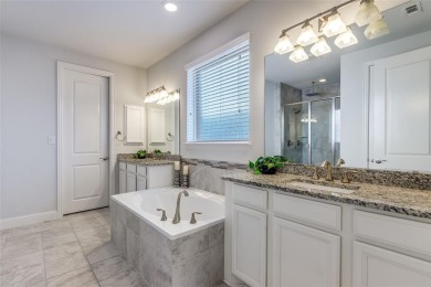 Stunning home in award-winning Tribute community on Lake on The Tribute At the Colony in Texas - for sale on GolfHomes.com, golf home, golf lot