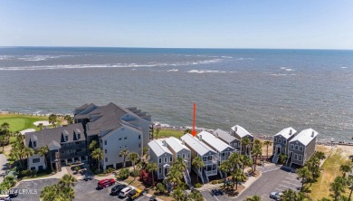 Discover coastal living with this stunning oceanfront cottage on Ocean Point Golf Links in South Carolina - for sale on GolfHomes.com, golf home, golf lot