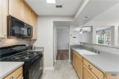 Welcome to this beautifully maintained 2 bed, 2.5 bath home in on Quail Creek Country Club in Texas - for sale on GolfHomes.com, golf home, golf lot