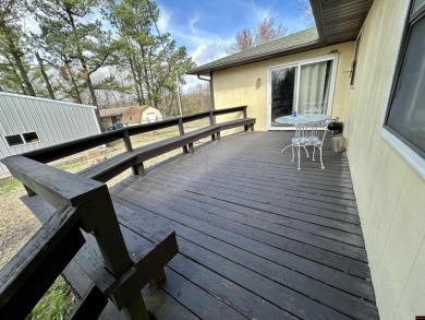 Three bedroom, three bath home just minutes from Lake Norfork on Twin Lakes Golf Club in Arkansas - for sale on GolfHomes.com, golf home, golf lot