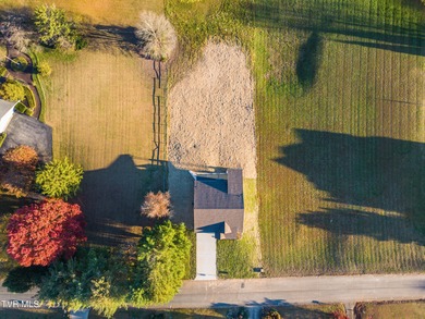 This beautiful new house is only missing one thing to become a on Kinser Park Golf Course in Tennessee - for sale on GolfHomes.com, golf home, golf lot