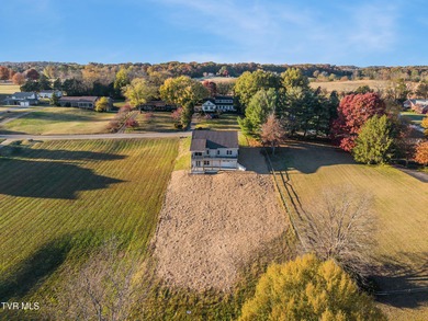 This beautiful new house is only missing one thing to become a on Kinser Park Golf Course in Tennessee - for sale on GolfHomes.com, golf home, golf lot