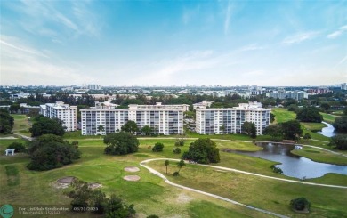 This beautiful 2-bedroom 2-bathroom condo located in the on Palm-Aire Country Club and Resort - Palms in Florida - for sale on GolfHomes.com, golf home, golf lot