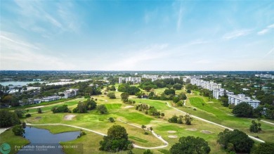 This beautiful 2-bedroom 2-bathroom condo located in the on Palm-Aire Country Club and Resort - Palms in Florida - for sale on GolfHomes.com, golf home, golf lot