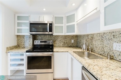 This beautiful 2-bedroom 2-bathroom condo located in the on Palm-Aire Country Club and Resort - Palms in Florida - for sale on GolfHomes.com, golf home, golf lot