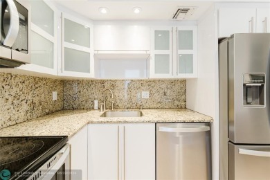 This beautiful 2-bedroom 2-bathroom condo located in the on Palm-Aire Country Club and Resort - Palms in Florida - for sale on GolfHomes.com, golf home, golf lot
