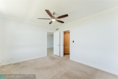 This beautiful 2-bedroom 2-bathroom condo located in the on Palm-Aire Country Club and Resort - Palms in Florida - for sale on GolfHomes.com, golf home, golf lot