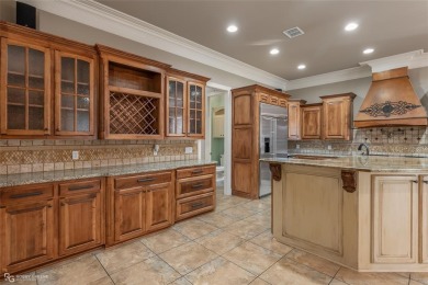 This stunning 4-bedroom, 4-bathroom home is located in the on Southern Trace Country Club in Louisiana - for sale on GolfHomes.com, golf home, golf lot