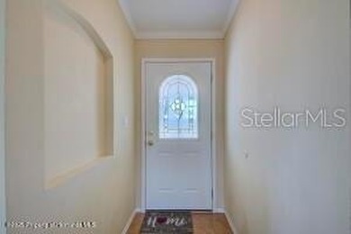 Welcome to your dream abode, nestled on a desirable corner lot on Brookridge Country Club in Florida - for sale on GolfHomes.com, golf home, golf lot