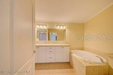 Welcome to your dream abode, nestled on a desirable corner lot on Brookridge Country Club in Florida - for sale on GolfHomes.com, golf home, golf lot