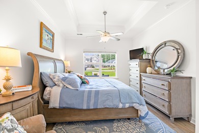 Live close to multiple beaches in a gated community loaded with on Brunswick Plantation and Golf Resorts in North Carolina - for sale on GolfHomes.com, golf home, golf lot