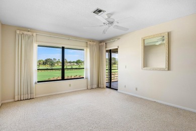 Experience timeless comfort and sweeping double fairway views in on Quail Ridge Golf Course and Country Club in Florida - for sale on GolfHomes.com, golf home, golf lot