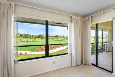 Experience timeless comfort and sweeping double fairway views in on Quail Ridge Golf Course and Country Club in Florida - for sale on GolfHomes.com, golf home, golf lot