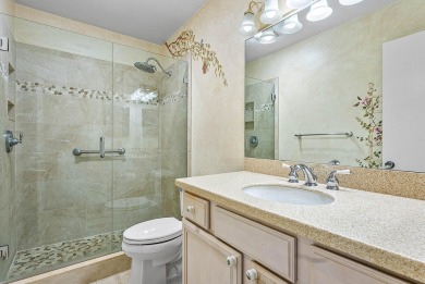 Experience timeless comfort and sweeping double fairway views in on Quail Ridge Golf Course and Country Club in Florida - for sale on GolfHomes.com, golf home, golf lot