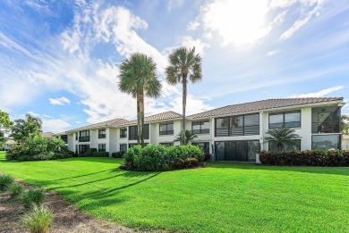 Experience timeless comfort and sweeping double fairway views in on Quail Ridge Golf Course and Country Club in Florida - for sale on GolfHomes.com, golf home, golf lot