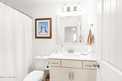 Live close to multiple beaches in a gated community loaded with on Brunswick Plantation and Golf Resorts in North Carolina - for sale on GolfHomes.com, golf home, golf lot