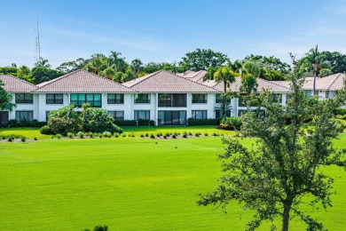 Experience timeless comfort and sweeping double fairway views in on Quail Ridge Golf Course and Country Club in Florida - for sale on GolfHomes.com, golf home, golf lot