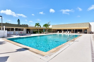 The latest news is that this 2nd floor Vista Gardens condo has on Vero Beach South Golf Course in Florida - for sale on GolfHomes.com, golf home, golf lot