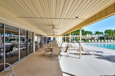 The latest news is that this 2nd floor Vista Gardens condo has on Vero Beach South Golf Course in Florida - for sale on GolfHomes.com, golf home, golf lot