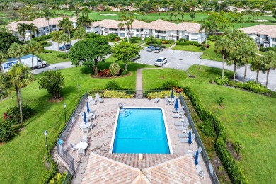 Experience timeless comfort and sweeping double fairway views in on Quail Ridge Golf Course and Country Club in Florida - for sale on GolfHomes.com, golf home, golf lot