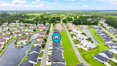 Live close to multiple beaches in a gated community loaded with on Brunswick Plantation and Golf Resorts in North Carolina - for sale on GolfHomes.com, golf home, golf lot