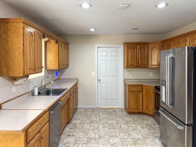 Sitting on a high peninsula in Janian Hills Subdivision, this 3 on Lost Woods Golf Course in Missouri - for sale on GolfHomes.com, golf home, golf lot